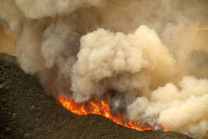 Massive wildfire in central California threatens homes